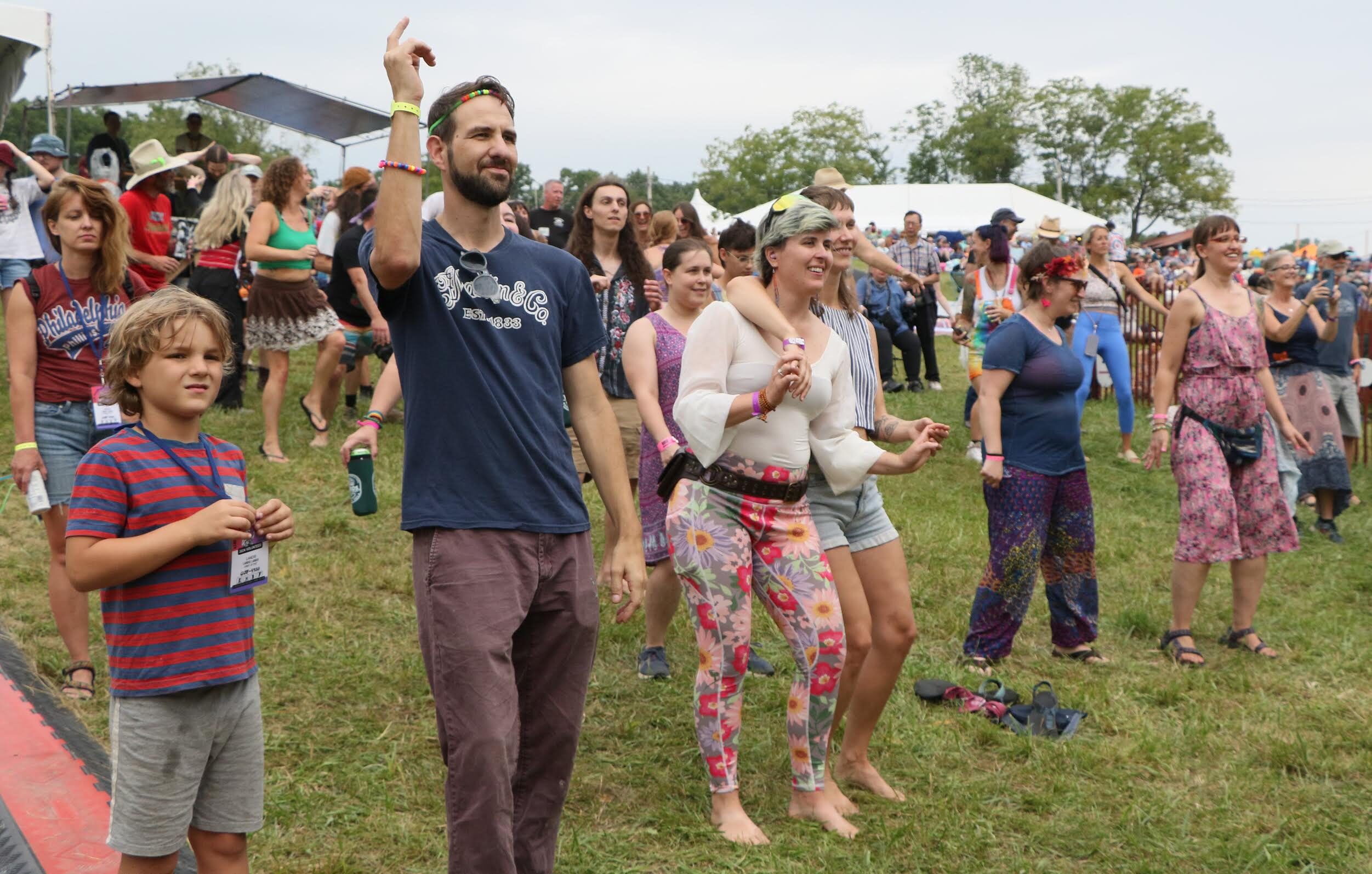 Host John Flynn welcomes back the ‘family’ at Philly Folk Festival